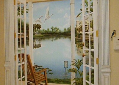 Trompe l'oeil a mano libera su parete