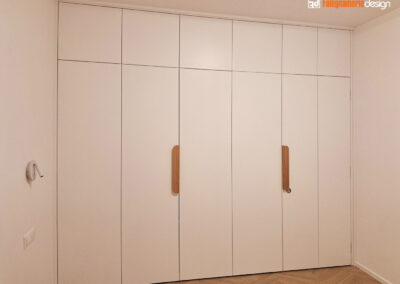 Armadio a muro con porta divisoria