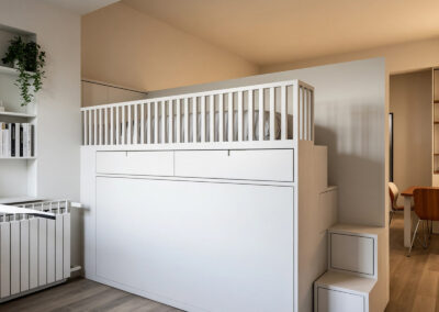 libreria divisoria con letto a scomparsa